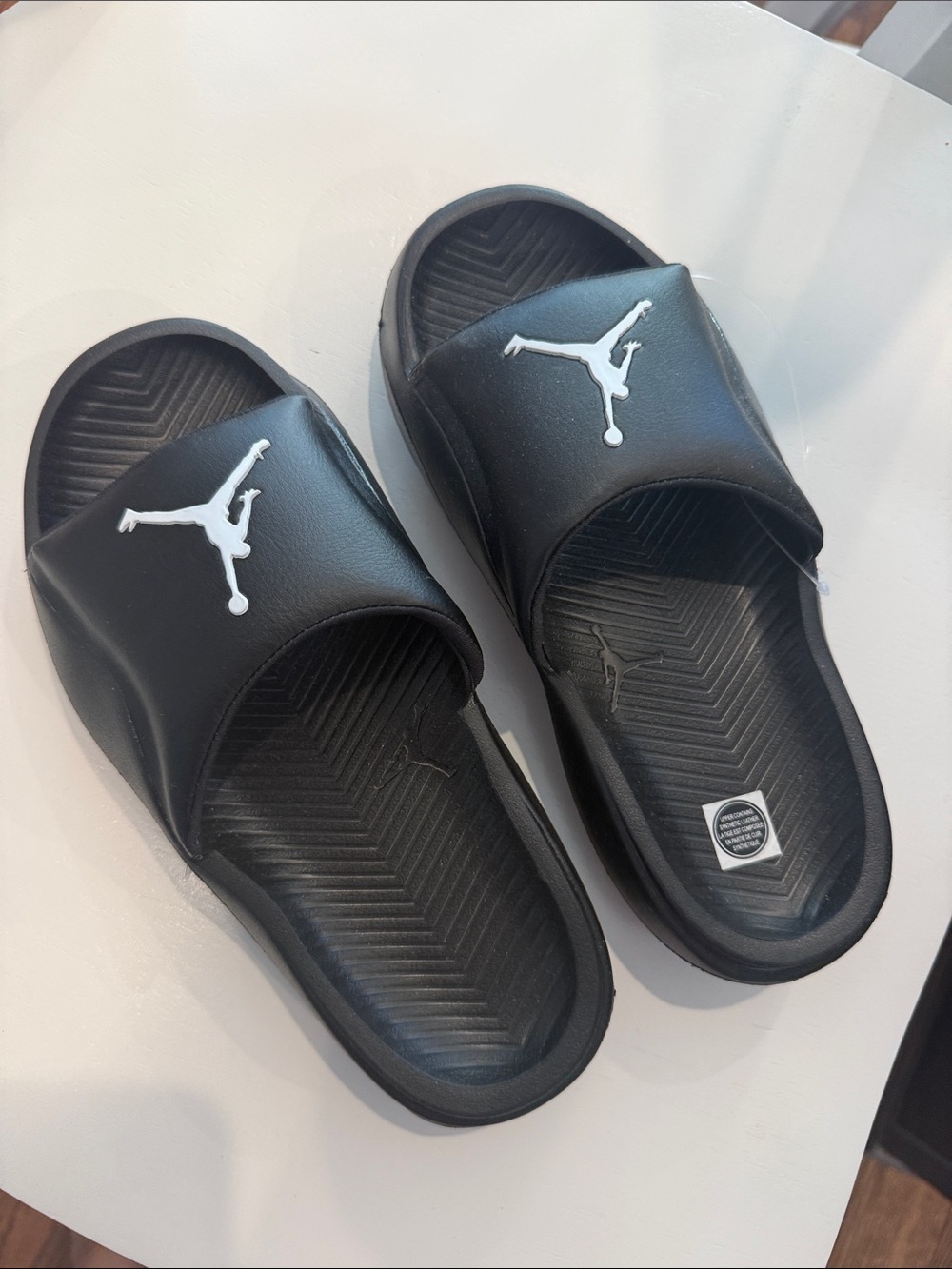 Jordan Black Slide Sandals with White Jumpman Logo